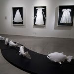 ROW Project Pat Field installation with archival baptismal dresses in background 2010